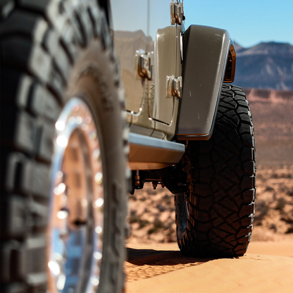 savvy Krawler Lite weld-on sliders tight high-clearance fit against Jeep Gladiator JT body, no-snag low-profile design