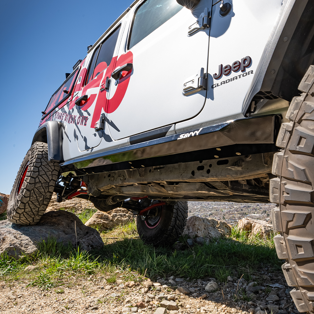 weld-on sliders tight high-clearance fit against Jeep Gladiator JT body, no-snag low-profile design