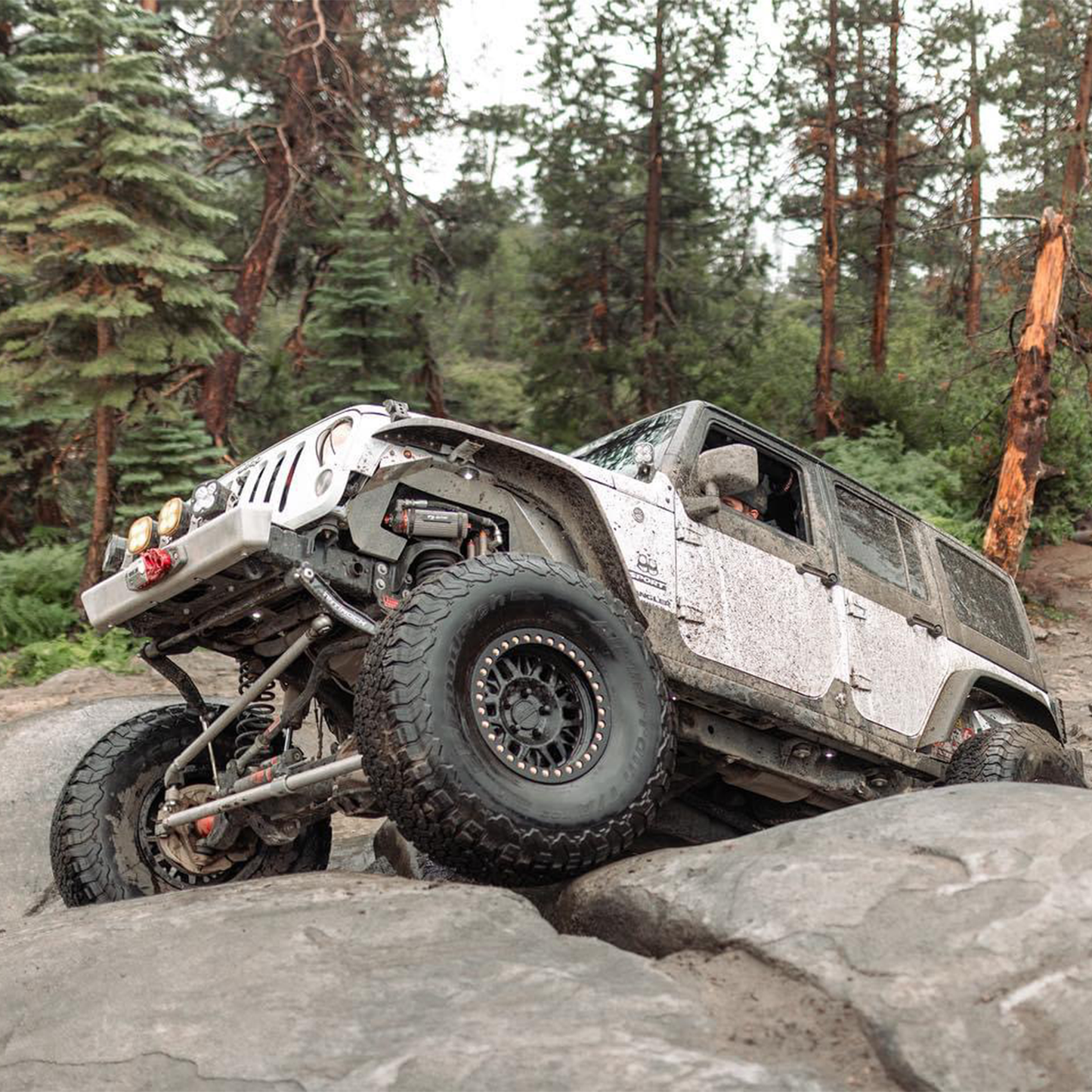 High-clearance Jeep JK front bumper without hoop and winch plate Warn Winch Baja Designs Lights Factor 55 Fairlead