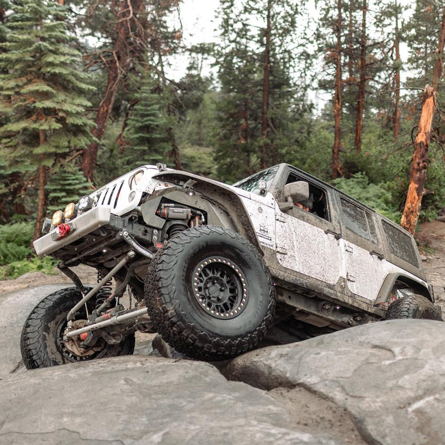 High-clearance Jeep JK front bumper without hoop and winch plate Warn Winch Baja Designs Lights Factor 55 Fairlead