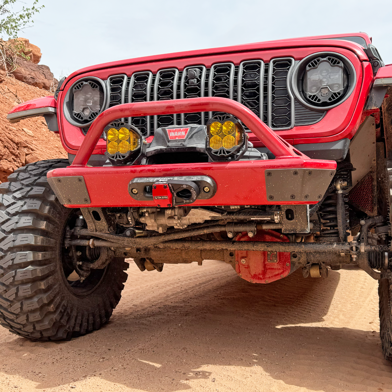 JL front bumper with hoop Warn winch mounted D-ring recovery setup Jeep JL trail-ready build
