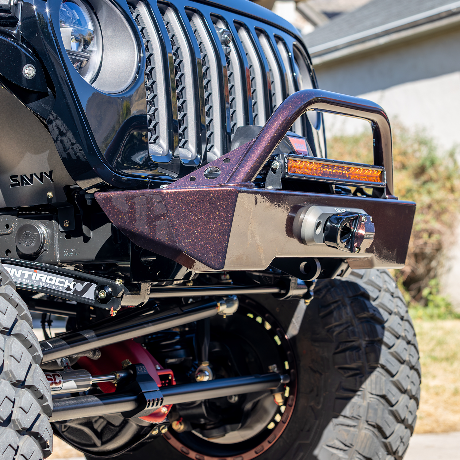 Savvy Offroad Krawler Lite aluminum front bumper with hoop installed on Jeep JL Wrangler, raw aluminum finish