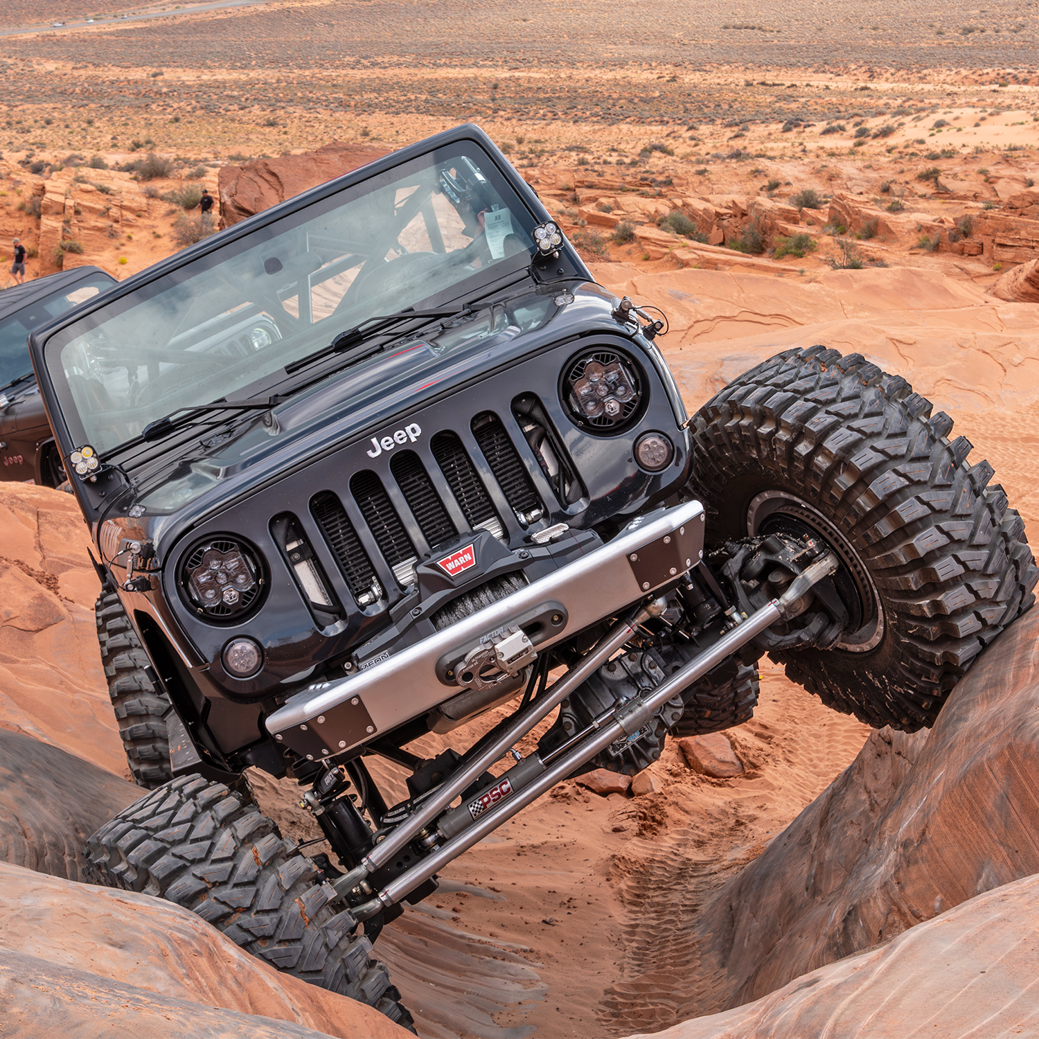 Jeep JK JKU front bumper with replaceable skin and Factor 55 fairlead Warn Winch