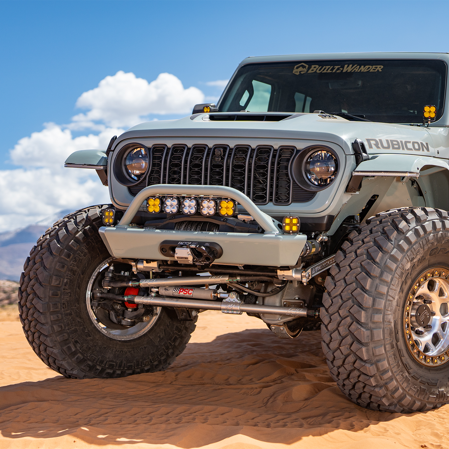 front bumper bolt-on hoop protecting Jeep JL grille and auxiliary lights, high-clearance approach angle