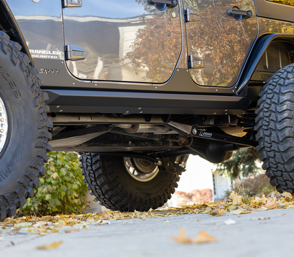 Jeep Wrangler JKU with complete Savvy KRAWLER ELITE armor bundle installed including bumpers, sliders, inner fenders, rocker trim, and spare tire delete
