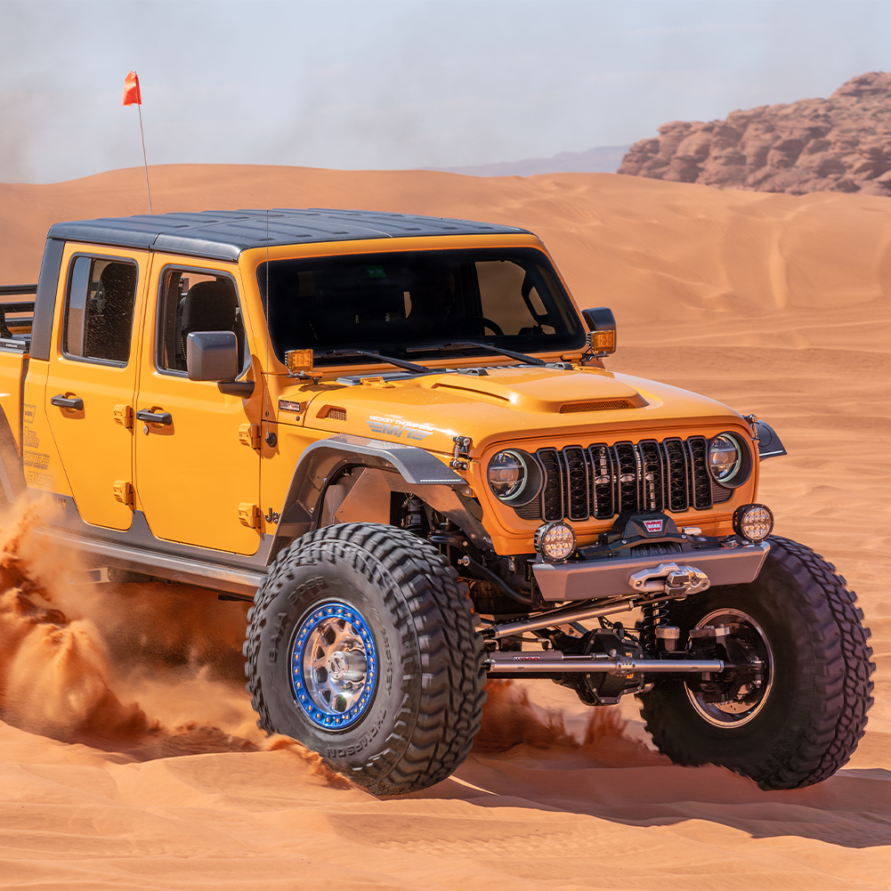Jeep Wrangler JL/JLU with Savvy LEGACY 6061 aluminum front and rear bumpers on an off-road trail