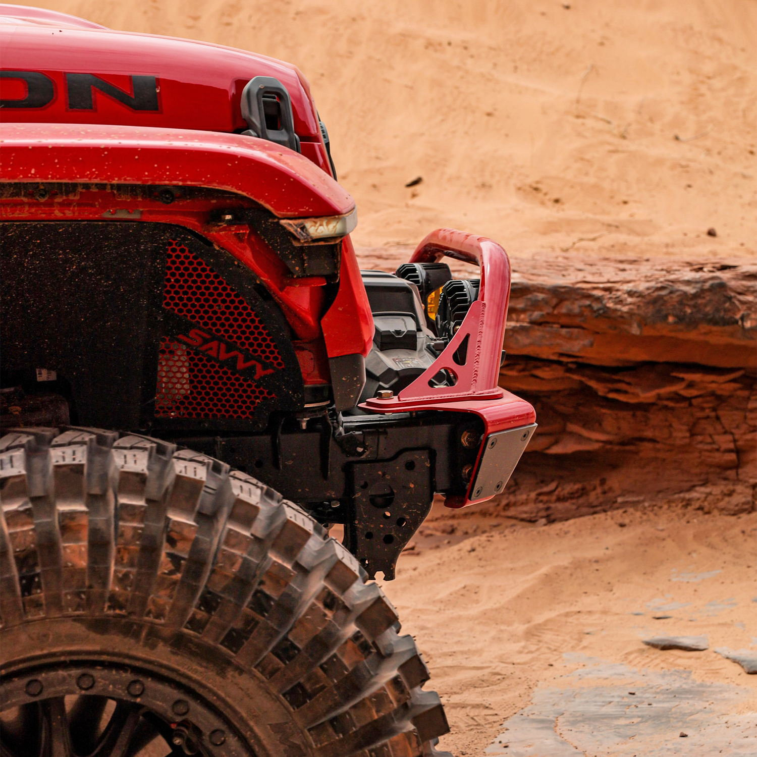 Jeep Wrangler JLU using Savvy LEGACY ELITE armor bundle on an off-road trail with high-clearance bumpers, sliders, and inner fenders