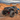 Jeep Wrangler JLU equipped with Savvy Offroad KRAWLER LITE bumpers and rock sliders rock crawling on a rugged off-road trail