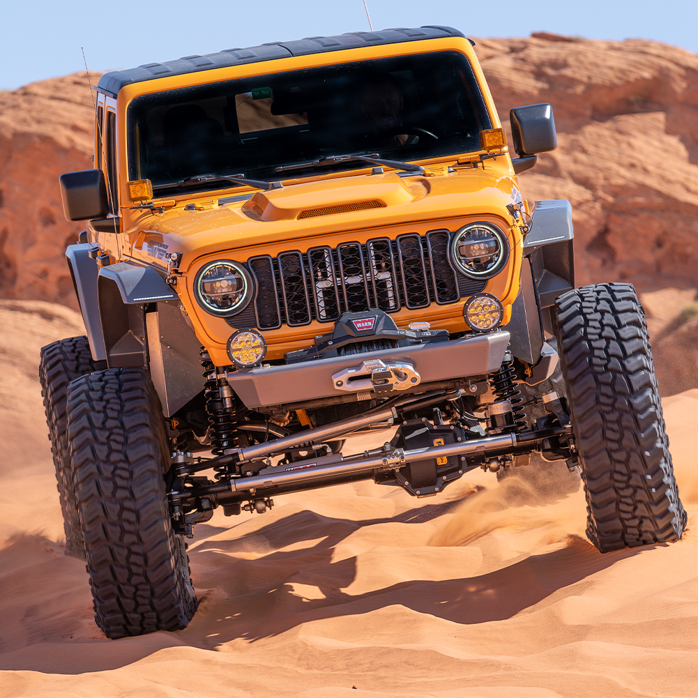 Close-up of Savvy Offroad LEGACY 6061 front bumper showing 3/16-inch steel winch plate with Factor 55 fairlead compatibility for synthetic rope protection